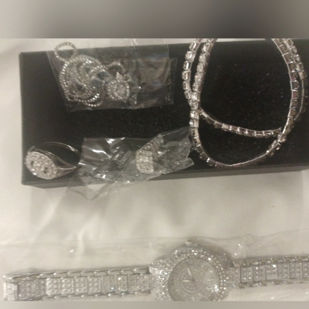 Silver custom jewelry Watch, bracelet, earrings, necklace.